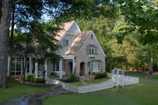 For a comfortable yet modest guest house nestled in a glen, a stone façade adds the perfect combination of dignity and charm. Project: Guest Cottage, Eads, Tenn.; Architect: Looney Ricks Kiss, Memphis, Tenn.; Builder: Hank Hill Co., Memphis; Landscape architect: Page Duke, Nashville, Tenn.