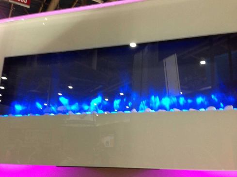 Heatilator  Providing ambiance and warmth to any room, the Simplifyre Modern electric fireplace updates the old-fashioned hearth with a high-tech light show. Either the flames or the ambient backlighting change colors at the press of a remote-controlled button. Select a black or white glass surround in 58- or 36-inch widths. 
www.heatilator.com