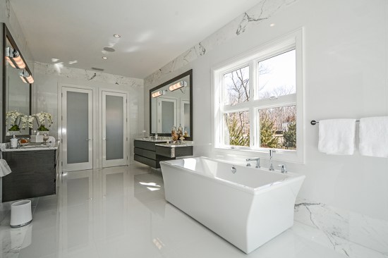 Master Bathroom, 2 private toilets, 2 8' vanities, soaking tub, radiant flooring Glassos tile, Calacatta marble