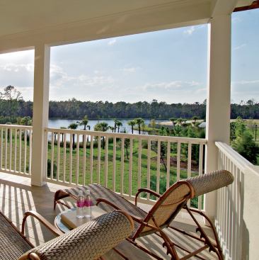 SCENIC OVERLOOK: A breezy balcony off the master suite sits on top of the loggia and above the pool, facing west. It's an ideal spot for bird-watching over morning coffee.