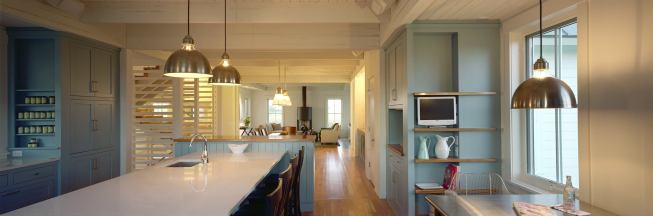 Inside the modern farmhouse, a mix of old and new tips a hat to the site's agricultural history. New influences include sleek materials and an open dining area. 
Project:
Anderson Farmhouse, Lake City, Minn. 
Architect: Rehkamp Larson, Minneapolis; 
Builder: Dovetail Renovation, Minneapolis.