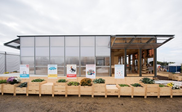 October 3, 2017 the Swiss École Polytechnique Fédérale de Lausanne, School of Engineering and Architecture Fribourg, Geneva University of Art and Design and University of Fribourg team presents their “NeighborHub” house, designed to be multi-purpose at 61st and Pena Station, Denver, Colorado. Exterior:   (Dennis Schroeder/US Department of Energy Solar Decathlon)