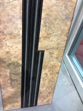 Fleetwood also added an outdoor version of its hidden track. A drain pan with water outlets allows the track to sit flush with tile, concrete, or other indoor/outdoor flooring. 
www.fleetwoodusa.net