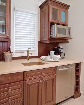 GREAT MIGRATION: Kitchen amenities appear in no fewer than six rooms throughout the home. A breakfast nook off the second-floor master suite allows late-night snackers or early-morning caffeine addicts to get their fix without disrupting the rest of the house.