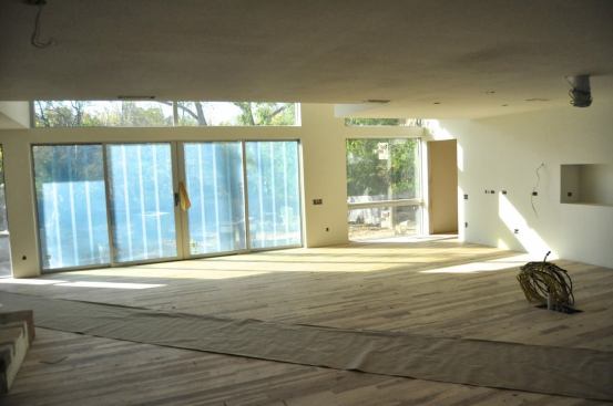 We install hardwood floors shortly after sheet rock is completed