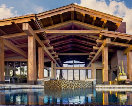This home’s heavy timber design is balanced by the lightness of its glassy pool, which makes the most of the site’s extensive views. Project: Desert Mountain, Scottsdale, Ariz.; Builder: The Phil Nichols Co., Scottsdale; Architect: Urban Design Associates, Pittsburgh