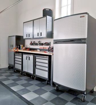 STORAGE SPACE: The garage can be an unruly place—unless there is adequate storage to keep things neat and tidy. Gladiator Garage-Works by Whirlpool Corp. is here to help. The anchor of the system is the 48-inch-long GearTrack Channel, from which wall cabinets, shoe racks, shelves, and hooks can be hung. Other pieces include a tall cabinet, a workbench with power strip, a refrigerator, and chemical-resistant roll flooring. www.gladiatorgw.com.