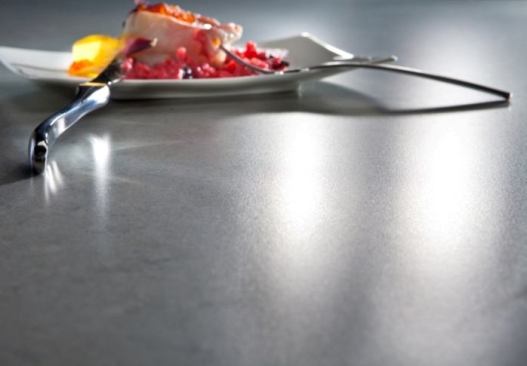 Silestone. The new matte-finish Suede quartz surfacing is soft to the touch and has bacteriostatic properties built in. More 
here.