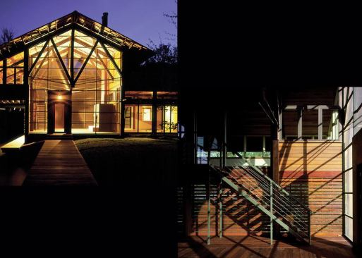 The transparent "boathouse" supplies the home's primary entry point.