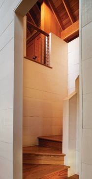 One of the "cubes" that rise through the building houses a compact stair.