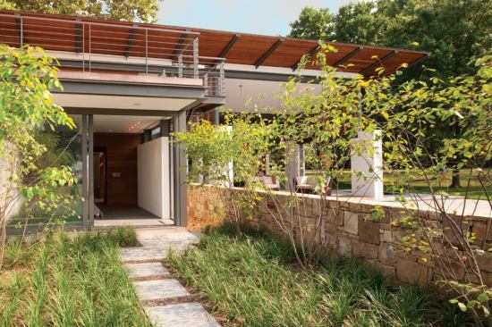 The bedroom opens up to a courtyard.