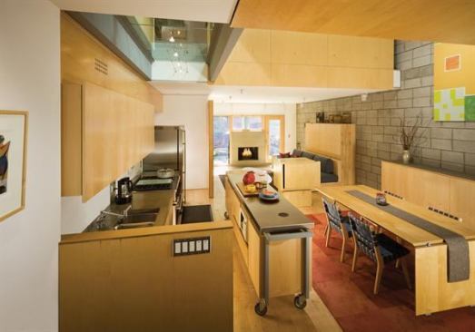 For their own compact kitchen, the owners of studio d’ARC architects opted for a wheeled island that stands at the ready when more prep space is needed, but doesn’t constrict the space’s flow when guests arrive. Project: Custom Kitchen, Pittsburgh; Architects: studio d’ARC, Pittsburgh.