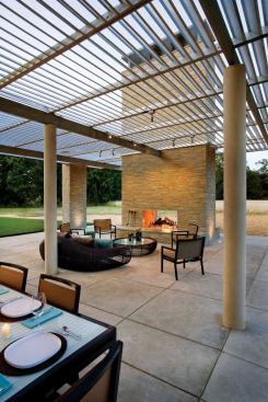 The full kitchen makes meal prep a breeze, and a fireplace with a built-in rotisserie warms chilly nights.