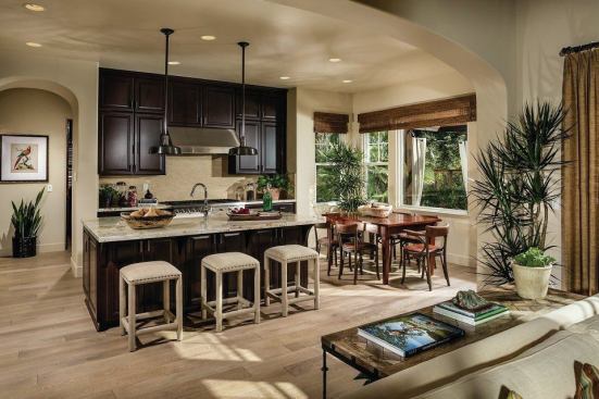 The Garden House plans come with large, open kitchens and up to four bedrooms plus den and 3.5 baths. Pictured here is the Garden House Plan 8.