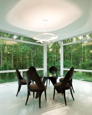 This split-level remodel features a two-story glass box with a breakfast room on the upper level that offers wide-open views to the forest beyond.   
Remodeling Design Awards (September 2011)  Whole-House Remodeling Over $500,000 Envision Design, Washington D.C.