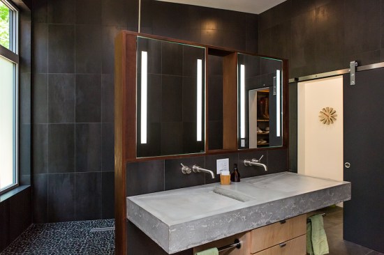 A local artisan created the concrete trough sink.