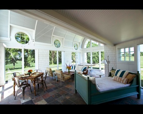 The screened porch is the perfecct place to enjoy the summer breeze, and there's room for sleepover guests, too. 