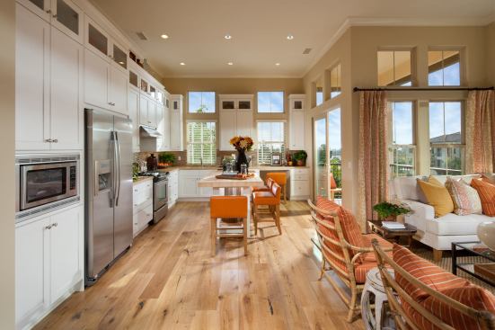 Grand, Multi-Family Housing Project - Under 18 du/acre (For Sale or Rent). Builder: Irvine Pacific. Architect: Bassenian Lagoni. Designed for young people, these Irvine, Calif., homes expand livable space with front porches and side courtyards.
