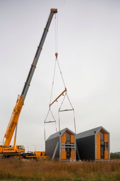 The ONE, shown in construction, can be easily transported and set up in a day.