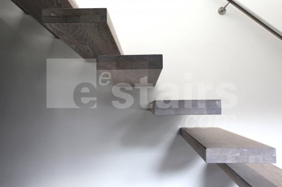 The manufacturer specializes in high-concept staircases of various materials and styles, including floating versions. Stairs can be produced in glass, steel, and stone. The Helical stair is shown here in wood. www.eestairs.com.