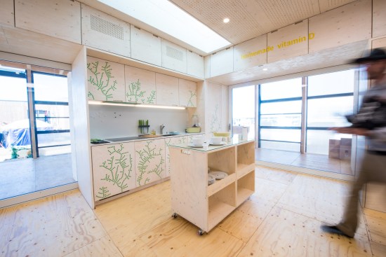 October 3, 2017 the Swiss École Polytechnique Fédérale de Lausanne, School of Engineering and Architecture Fribourg, Geneva University of Art and Design and University of Fribourg team presents their “NeighborHub” house, designed to be multi-purpose at 61st and Pena Station, Denver, Colorado. Interior:   (Dennis Schroeder/US Department of Energy Solar Decathlon)