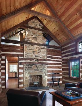 In the 16-by-16-foot 1794 cabin, the building team removed the second floor and restored the original fireplace.