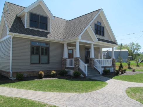 Down the road from Mod-U-Kraf’s factory in Virginia is its sales office complex, which includes three models and a design center. Pictured is a 2,084-square-foot Craftsman-style, Energy Star-rated home with three bedrooms and 2½ baths.