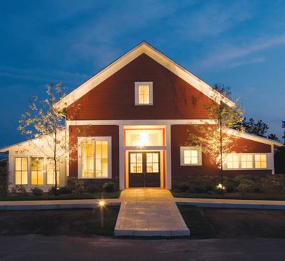 The main building's lower level opens to the great lawn, where a wall of glass folds back, creating a 21-foot opening through which folks can spill out for large events.