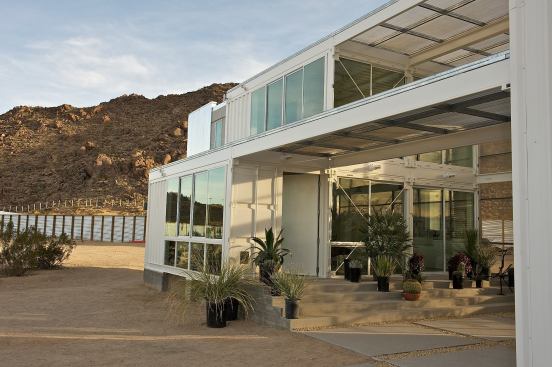 A shaded solar breezeway provides a protected and naturally cooled outdoor room that extends the interior living spaces.