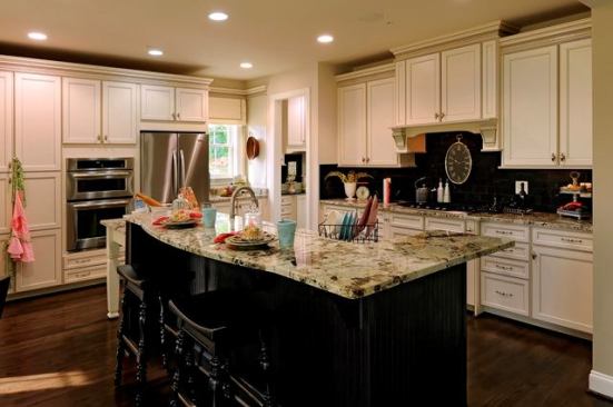 The kitchen features 42-inch oak cabinets and granite countertops. Energy Star appliances are standard.