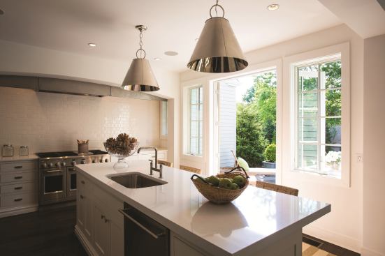 Homeowners want easy access to the backyard patio and grill from the kitchen.