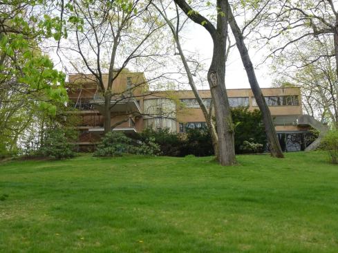 The Alan I W Frank House with scaffolding for exterior restoration.