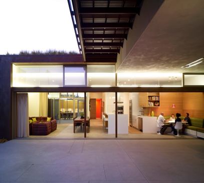 Designed for passive efficiency, Yin Yang House is mostly one-room deep, so both floor plan and site orientation maximum advantage of the elements: sun for warmth and light and breezes for natural ventilation. A glassed-in dining area opens to the courtyard. 
Project:
Yin Yang House, Venice, Calif.; 
Architect: Brooks + Scarpa, Los Angeles; 
Builder: Glenn Lyons Construction, Venice.