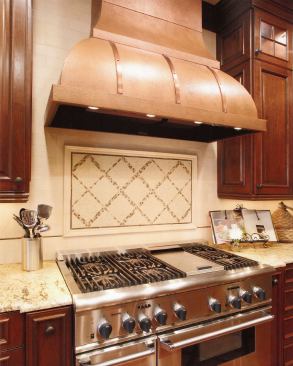 Custom copper vent hood. Project: Callie’s Kitchen, Bellaire, Texas; Designer/Fabricator: Andrea Kralj, Houstin, Texas.