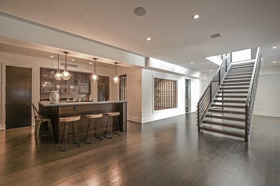 Bar, wine room, custom staircase.
