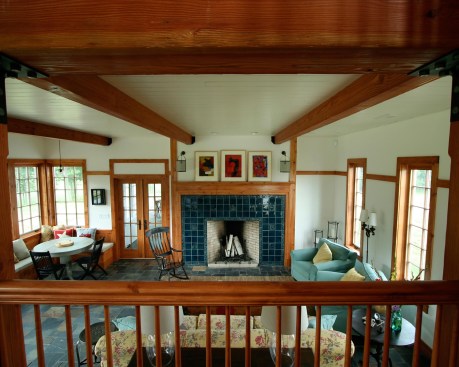 The stair landing, which looks out onto the living room, is a great place for kids to spy on grownups, and for grownups to keep an eye and ear on kids, providing both "an audible and visual connection," says Goulette. 
