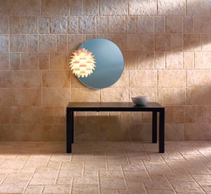 The Rock Rock collection uses new technology to create porcelain tile that mirrors the look of natural stone. Tiles come in a variety of styles. The Shellstone series (shown) is available in a 21-by-21-inch size, a 13-by-21-inch size, and three colors. Roca. 305.446.4387. www.rocatile.com.