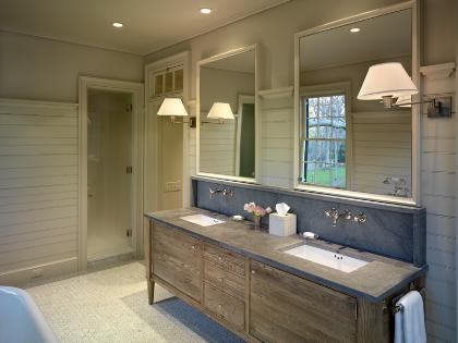 Pursley Architecture answered the clients' needs for a spa-like master bath with this contemporary design. For minimal disruption to the 1930's-era home, Hubert Whitlock Builders created an entrance through the window.