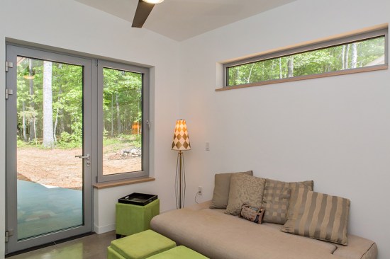 The sunny guest room has its own exterior entrance.