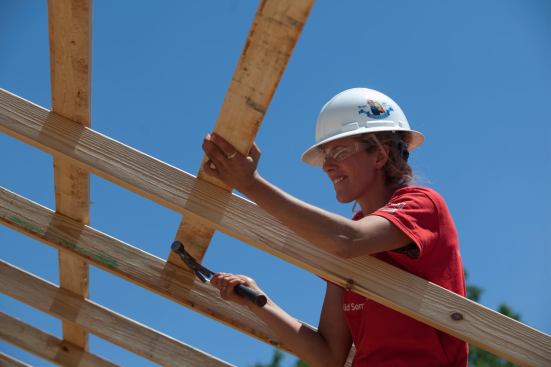 CHARLOTTE, NC -  Mary Bumgardner works on the roof structure of a home during the Habitat for Humanity Women Build in Charlotte, NC on May 5, 2011.  Celebrity on-site building is actress Emily Bergl. (Photo by Jessica McGowan)