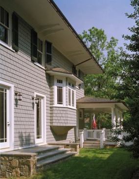 Looking toward the front of the home, with French doors connecting the dining room to the yard.