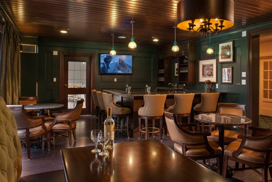 Stonebridge at Burlington, Burlington, Mass. Designed by The Architectural Team for the Northbridge Companies, Stonebridge combines facilities for various levels of assisted-living and memory care into a single amenity-rich environment. The handsome facility incorporates the latest design concepts for the comfort and health of aging populations, such as this elegantly appointed tavern.