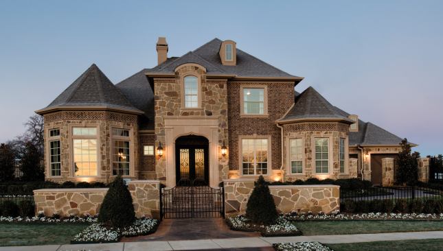 While Standard Pacific's new floor plans often mark a big shift from their neighbors, exteriors are made to match the market. In this case, the Exeter model at Shady Oaks in Southlake, Texas, reflects the grand facades common in new Texas communities.