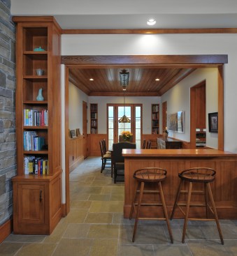 From the garage, the back entrane to the house leads into the breakfast room, which opens to the family room and the kitchen. 