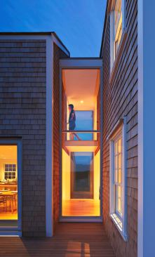 Passages between second-floor rooms take the form of bridges that span from one pavilion to another.