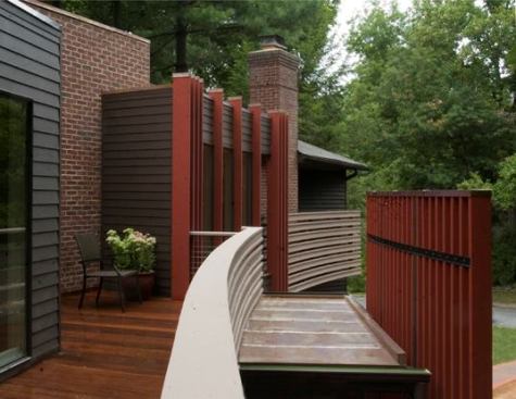 Building upon the existing '70s color and material palate, the renovation improves both with new architectural elements.