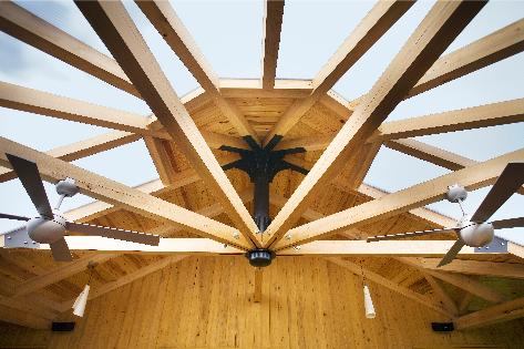 The project's designers are also its builders, in homage to the art and craft of the ancient masterbuilder. They designed the roof shape and exposed timber-and-steel structural system to both work with the difficult existing roof conditions and shape a pleasing room beneath it.
