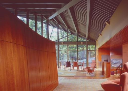 Glazed walls give the owners expansive views of their pastoral property