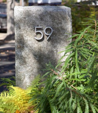 The+street+address+is+composed+of+stainless+steel+letters+floating+on+a+granite+pier%2c+a+modern+take+on+a+classic+New+England+tradition.+All+of+the+granite+curbing+was+salvaged+from+a+nearby+IKEA+parking+lot.+