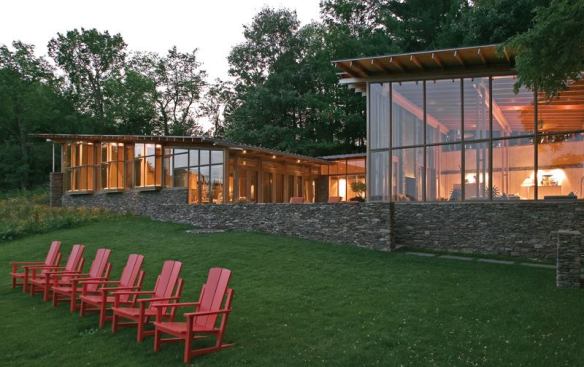 A sheltered courtyard with a fireplace extends the outdoor-living season.